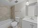 Clean bathroom with tile shower/tub and white vanity at 208 Diamond Cv # 104, Casselberry, FL 32707