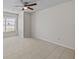 Spacious bedroom with tile floors and ceiling fan at 208 Diamond Cv # 104, Casselberry, FL 32707