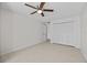 Bedroom with tile floors, ceiling fan, and large closet at 208 Diamond Cv # 104, Casselberry, FL 32707