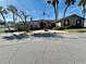 Community center with welcoming entryway and flag at 208 Diamond Cv # 104, Casselberry, FL 32707