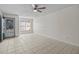 Bright living room featuring tile floors and a ceiling fan at 208 Diamond Cv # 104, Casselberry, FL 32707