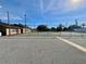 Community tennis court with fencing at 208 Diamond Cv # 104, Casselberry, FL 32707