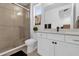 Modern bathroom with a walk-in shower and neutral tones at 2309 Depauw Ave, Orlando, FL 32804