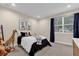 bedroom with neutral walls and plenty of natural light at 2309 Depauw Ave, Orlando, FL 32804