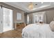 Bright bedroom with en-suite bathroom and access to backyard at 2309 Depauw Ave, Orlando, FL 32804