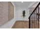 Bright entryway with hardwood floors and statement wall art at 2309 Depauw Ave, Orlando, FL 32804