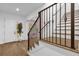 Elegant entryway with a staircase and a view into a home office at 2309 Depauw Ave, Orlando, FL 32804
