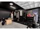Well-equipped home gym featuring various weightlifting and cardio machines at 2309 Depauw Ave, Orlando, FL 32804