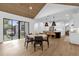 Modern kitchen island with white quartz countertops and dark brown cabinetry at 2309 Depauw Ave, Orlando, FL 32804