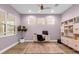 Spacious home office with light purple walls and a built-in bookcase at 2309 Depauw Ave, Orlando, FL 32804