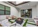 Outdoor patio featuring a fire pit and access to the house at 2309 Depauw Ave, Orlando, FL 32804