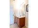 Bathroom featuring a sink with cabinet at 2553 Dharma Cir, Kissimmee, FL 34746