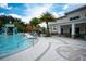 Large community pool with a water slide and play area at 2553 Dharma Cir, Kissimmee, FL 34746