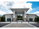Elegant community pool house entrance with gated access at 2553 Dharma Cir, Kissimmee, FL 34746