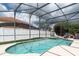 Screened pool with patio furniture at 2553 Dharma Cir, Kissimmee, FL 34746