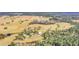Aerial view showing home, pond, and large acreage property at 26225 Pitts Rd, Eustis, FL 32736
