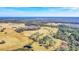 Aerial view of property showing home and surrounding land at 26225 Pitts Rd, Eustis, FL 32736