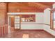 Dining area with wood-beamed ceiling and tile floors at 26225 Pitts Rd, Eustis, FL 32736