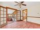 Rustic dining room with tile floors and access to a sunroom at 26225 Pitts Rd, Eustis, FL 32736