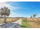 Long driveway leading to a rural property at 26225 Pitts Rd, Eustis, FL 32736