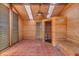 Private sauna with wood interior and tile flooring at 26225 Pitts Rd, Eustis, FL 32736