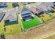 House with gray roof and artificial turf backyard at 275 Sunfish Dr, Winter Haven, FL 33881