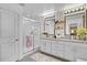 Elegant bathroom with double vanity and walk-in shower at 275 Sunfish Dr, Winter Haven, FL 33881