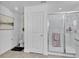 Modern bathroom with a toilet, shower, and vanity at 275 Sunfish Dr, Winter Haven, FL 33881