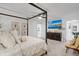 Spacious bedroom with a large bed, dresser, and TV at 275 Sunfish Dr, Winter Haven, FL 33881