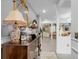 Elegant entryway with an antique console table and a view into the living room at 275 Sunfish Dr, Winter Haven, FL 33881