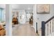 Bright and spacious entryway with tile flooring, leading to living room and staircase at 275 Sunfish Dr, Winter Haven, FL 33881