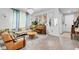 Bright living room with a piano, chandelier, and comfortable seating at 275 Sunfish Dr, Winter Haven, FL 33881
