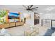 Spacious loft area with large TV, comfortable seating, and gallery wall at 275 Sunfish Dr, Winter Haven, FL 33881