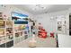 Playroom with colorful accents, built-in shelving, and a view of the bathroom at 275 Sunfish Dr, Winter Haven, FL 33881