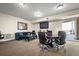 Community room with seating area and large TV at 2801 S Ridgewood Ave # 807, South Daytona, FL 32119