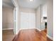 Bright condo entry with hardwood floors and kitchen view at 2801 S Ridgewood Ave # 807, South Daytona, FL 32119