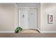 Condo entry with double doors,plant,and fire extinguisher at 2801 S Ridgewood Ave # 807, South Daytona, FL 32119