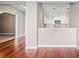 Modern kitchen with white cabinets, granite counters, and stainless steel appliances at 2801 S Ridgewood Ave # 807, South Daytona, FL 32119