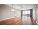 Spacious condo living room with hardwood floors and water views at 2801 S Ridgewood Ave # 807, South Daytona, FL 32119