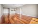 Bright condo living room with hardwood floors and kitchen view at 2801 S Ridgewood Ave # 807, South Daytona, FL 32119
