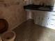 Bathroom with vanity and tiled floor at 34847 Learn Rd, Leesburg, FL 34788