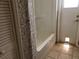 Clean bathroom with a shower and tiled floor at 34847 Learn Rd, Leesburg, FL 34788