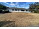 Single story home with a large yard at 34847 Learn Rd, Leesburg, FL 34788