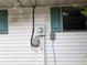 Side of house with electric meter and siding at 34847 Learn Rd, Leesburg, FL 34788