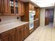 Spacious kitchen featuring ample cabinetry and modern appliances at 34847 Learn Rd, Leesburg, FL 34788