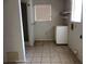 Laundry room with built-in sink and shower at 34847 Learn Rd, Leesburg, FL 34788