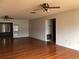 Spacious living area featuring hardwood floors at 34847 Learn Rd, Leesburg, FL 34788