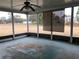Screened porch with view of backyard at 34847 Learn Rd, Leesburg, FL 34788