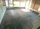 Large screened porch with concrete floor at 34847 Learn Rd, Leesburg, FL 34788