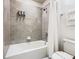 Bathroom with shower/tub combo and gray tile at 3798 Lana Ave, Davenport, FL 33897